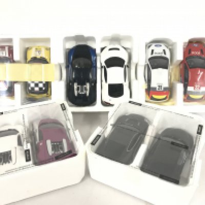 A Collection of 10 Scalextric Cars including Minis.