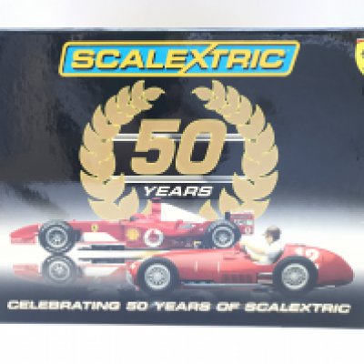 A Boxed Scalextric 50 Years of Scalextric Ferrari Set complete With Book.