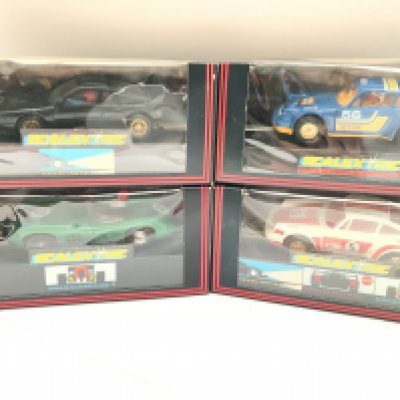 4 Boxed Scalextric Cars. Including a Martini Lancia.a Aston Martin.etc.