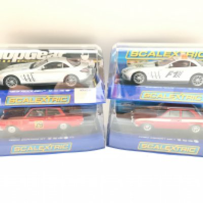 4 Boxed Scalextric Cars including A Ford Cortina. Ford Escort. A Mercedes-Benz SLR McLaren and a Mercedes-Benz SLR McLaren Safety Car.