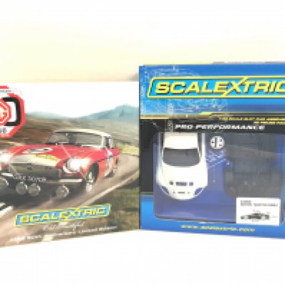 A Boxed Scalextric old Faithfull MG 50th Anniversary Limited Edition and a Scalextric Assembly Kit for a Aston Martin DBR9.