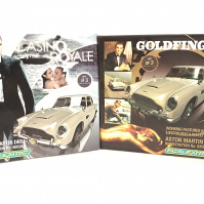 2 Boxed Scalextric James Bond Cars. Both Aston Martins D.B.5s from Casino Royal and Goldfinger.