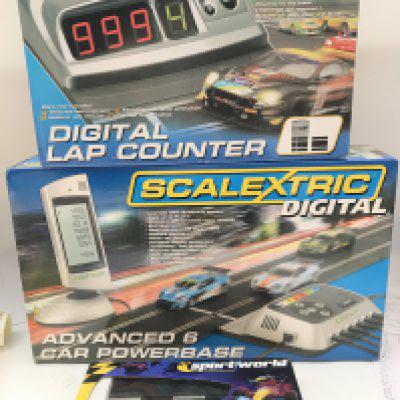 A Boxed Scalextric Advanced 6 Car Powerbase. A Digital Lap Counter and Current Break Tack.