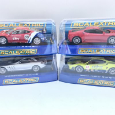 4 X Boxed Scalextric Cars. 2 X Ferrari F430 GT. A Ferrari F430. A Mercedes-Benz SLR McLaren.