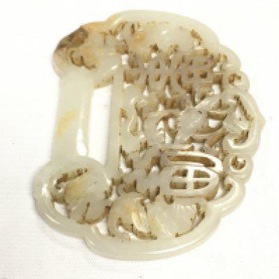A jade ornamental carving, approx 8cm x 6.5cm. NO RESERVE