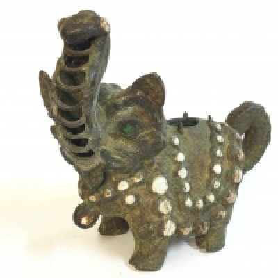 An Asian oriental cast metal elephant censer , 19cm tall approximately. 22cm wide . NO RESERVE