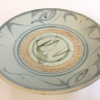 A large Chinese blue and white Ming porcelain dish , hairline cracks seen. 25cm wide.  NO RESERVE