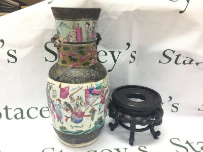 A well painted antique Chinese vase depicting a warriors scene , square mark to base. Vase 37cm tall. With wooden base