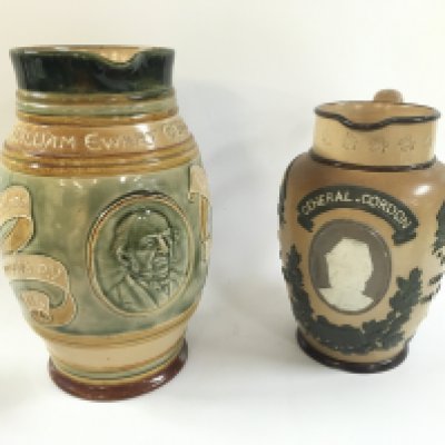 Two Doulton lambert jugs.