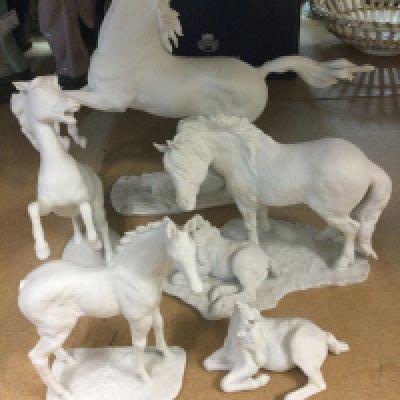A collection of five Kaiser white glazed porcelain horse figures .- NO RESERVE