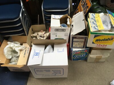 A large collection of drinking glasses, some ceramic jugs