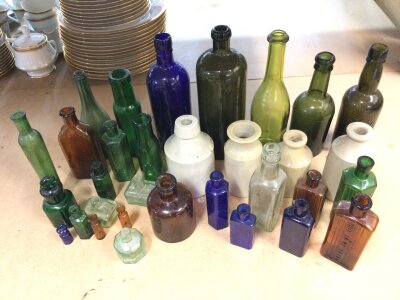 A collection of antique glass bottles