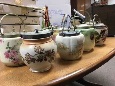 A collection of late 19th/early 20th porcelain Biscuit barrels