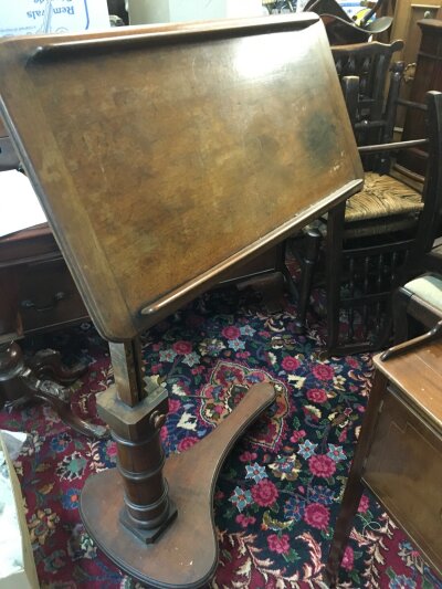 An adjustable Lectern with label D.Hill Carter & Co London house, 116cm tall