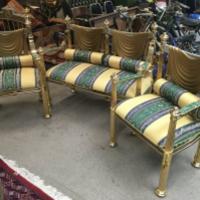 A pair of vintage Versace style gold-tone chairs with green and gold striped upholstery and a matching sofa. 98cm tall 70cm wide 50cm long