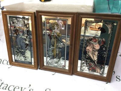Three framed art nouveau style mirrors.