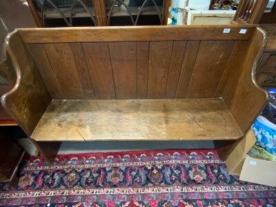 A 19th century oak settle. 158cm