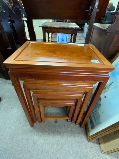a nest of 4 Chinese elm side tables. H.66cm x 35.5cm x 50cm