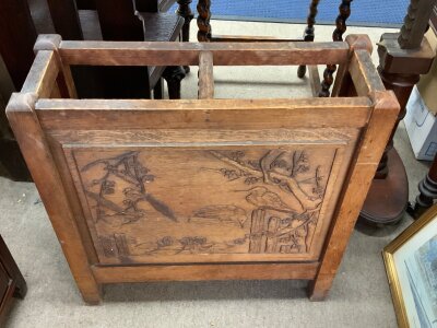 A small oak hall stand inset with a Chinese inspired panel.