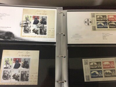 Twelve Albums of Elizabeth II Pictorial unused presentation stamps and first day covers including first day covers from 1964 onwards.