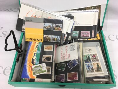 A collection of presentation packs.