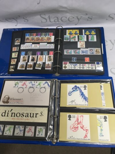 A box of stamps, first day covers and presentation packs.