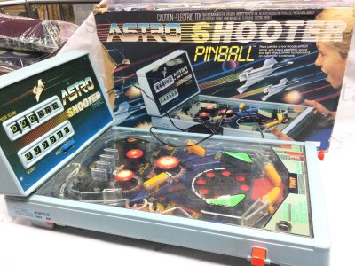 A boxed vintage Tomy Astro Shooter pinball machine