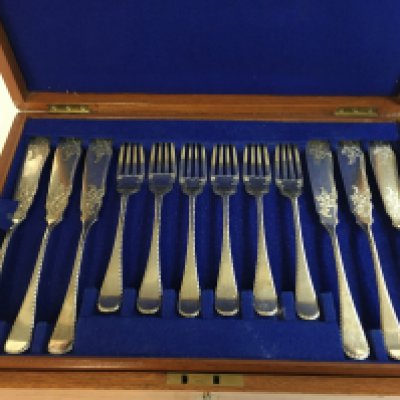 A two tier fish knives and forks cutlery set . NO RESERVE