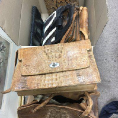 A collection of ladies handbags comprising snakeskin and crocodile skin examples plus a small sewing box and a framed religious picture. NO RESERVE