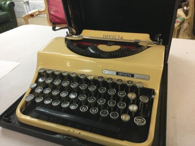 A vintage Italian Invicta type writer