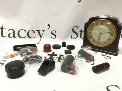 A collection of vintage Bakelite including a clock, whistle, cross pendant , tray etc