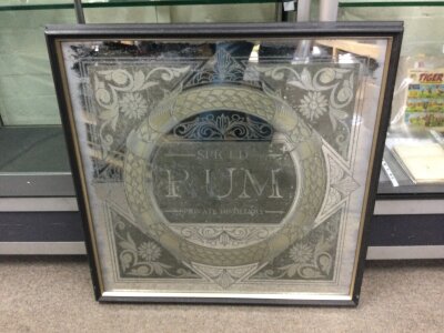 A large vintage spiced rum advertising mirror frame size 68x70cm
