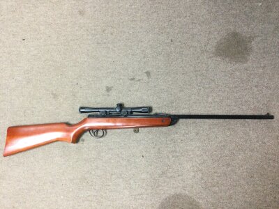 An BSA Meteor air gun with a scope, mechanism functioning