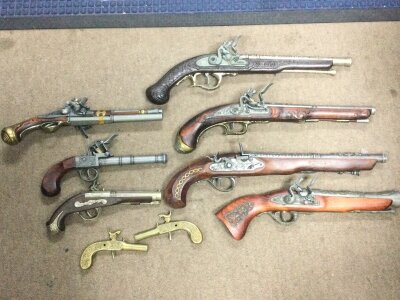 A collection of replica flint locks