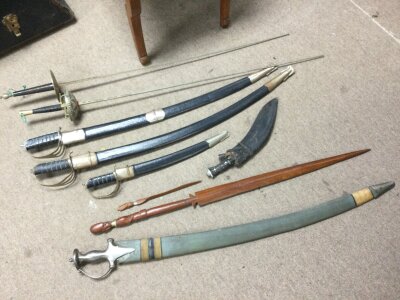 A collection of swords including Indian and Tolidio