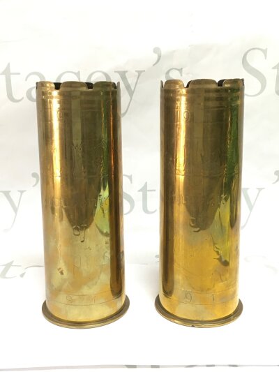 Two brass shell cases.