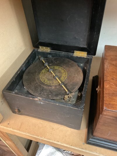 A  ebonized cased symphonion .