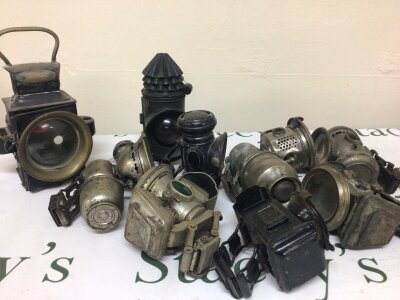 A Collection of Vintage bicycle and motor bike lamps and motor vehicle lamps including a British Military issue lamp. NO RESERVE.