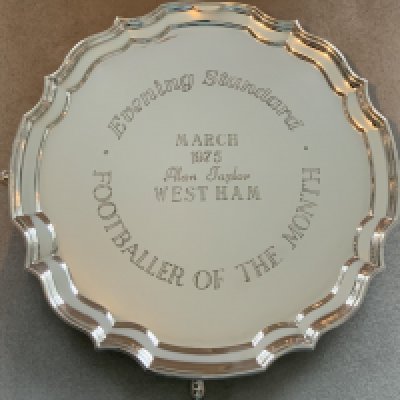1975 West Ham Player Of The Month Evening Standard Award: Stunning footed silver coloured dish in mint condition. Inscribed Evening Standard Footballer Of The month March 1975 Alan Taylor West Ham. Measures 10 inches accross.