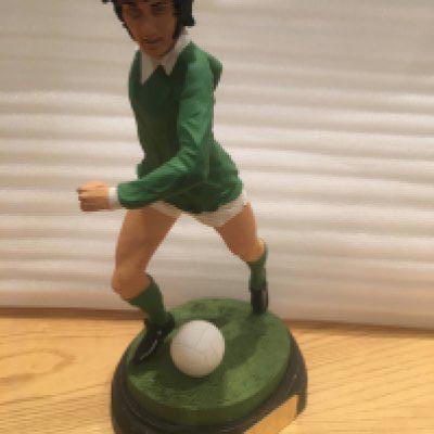 George Best Northern Ireland Football Figure: Excellent lifelike figure featuring Best In Northern Ireland kit wearing number 11. Sitting on base with plaque measuring 9 inches high including base.