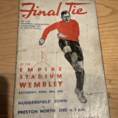 1938 FA Cup Final Football Programme: Huddersfield v Preston which has heavy fold and taped spine. Bit of wear but complete with no team changes.