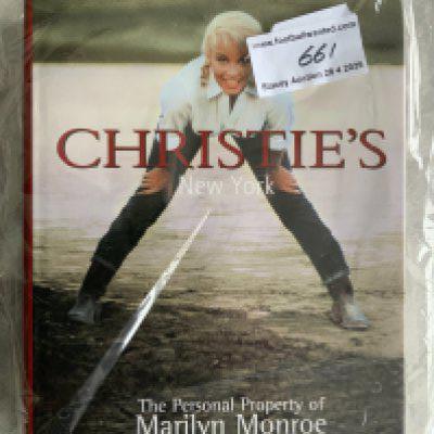 Marilyn Monroe Christies New York Hardback Auction Book: Over 400 pages in this stunning heavy book for the 1999 sale of Marilyn Monroes personal property. Tiny tear to dust jacket rear page.