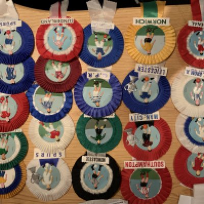 Football Club Rosettes: Stunning with plastic footballer in club kit to centre. Includes Tottenham Arsenal West Ham Leicester Man City and West Brom. Excellent. (22)