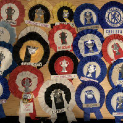 Football Club Cup Rosettes: FA Cup and Amateur Cup to centre with some stating good luck. Includes West Auckland Hounslow Kings Lynn Sutton Corinthian Casuals Enfield Woking Millwall Cardiff and Luton. Excellent. (47)