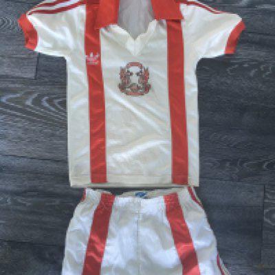 Orient 1980 - 1981 Replica Football Kit: Kids Adidas shirt and matching Spall Sports shorts. Very rare to find this iconic original kit from their centenary year.