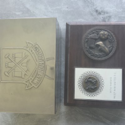 West Ham Football Memorabilia: Original German 1965 West Ham pennant listing 3 earlier ECWC winners then a West Ham badge and date of 1965 final. C/W a plaque stating thanks from West Ham, silver coloured small box with West Ham embossed logo and a few West Ham marbles.