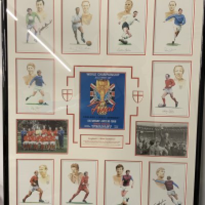 England 1966 World Cup Winners Signed Football Display: Massive genuine quality framed display of the 10 winning players in their club kit on a print individually hand signed without dedication. Expensively framed with picture of the final programme and 2 pictures including a team group. Only lacking Bobby Moore who had died before this series was made. Measures 33 x 41 inches. Not for posting.