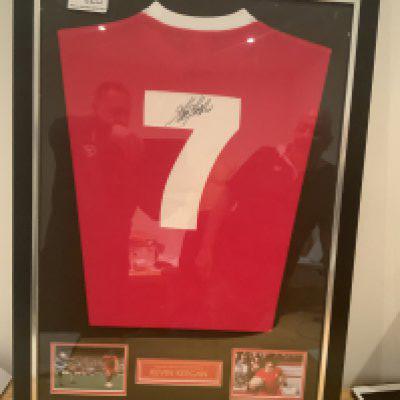 Kevin Keegan Signed Framed Liverpool Football Shirt: Number 7 replica red shirt signed to rear clearly in marker pen by Kevin Keegan.