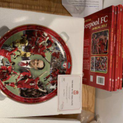 Liverpool Football Memorabilia: Large Danbury Mint plate from 2005 named The Road To The Final, Annuals, Breedon Complete Record book, Bed spread, Bar towels, Shankly plate, Scarves, Pennants, Programmes a few 70s tickets and more.