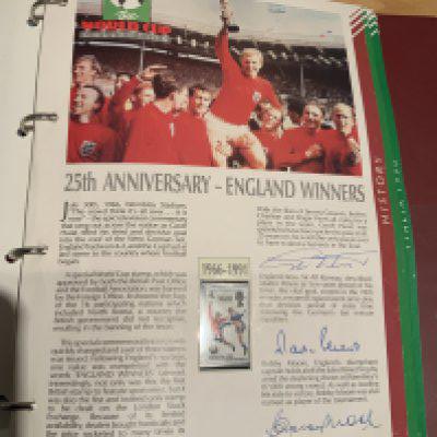 1966 England World Cup Signed Collection: The World Cup Collection folder covering 1990 but in the history section is a page hand signed by Alf Ramsey and another by Moore Hurst and Peters. Nice genuine item.